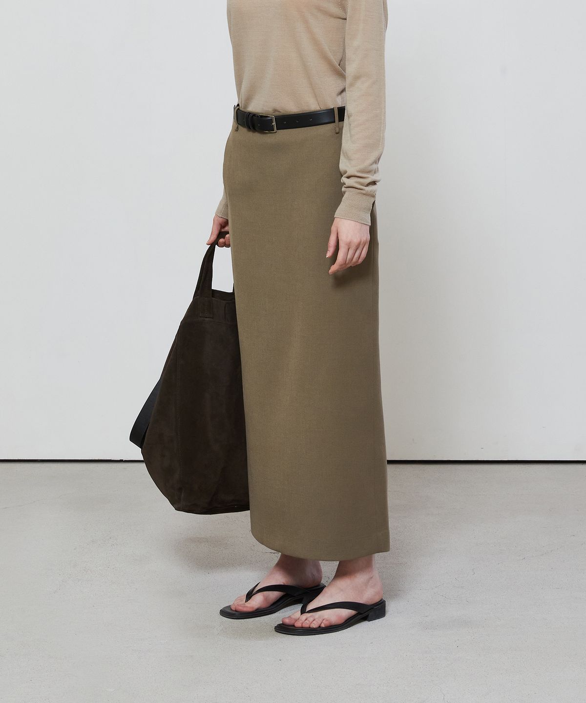 노티아(NOTIA) STANDARD FIT LONG SKIRT - KHAKI