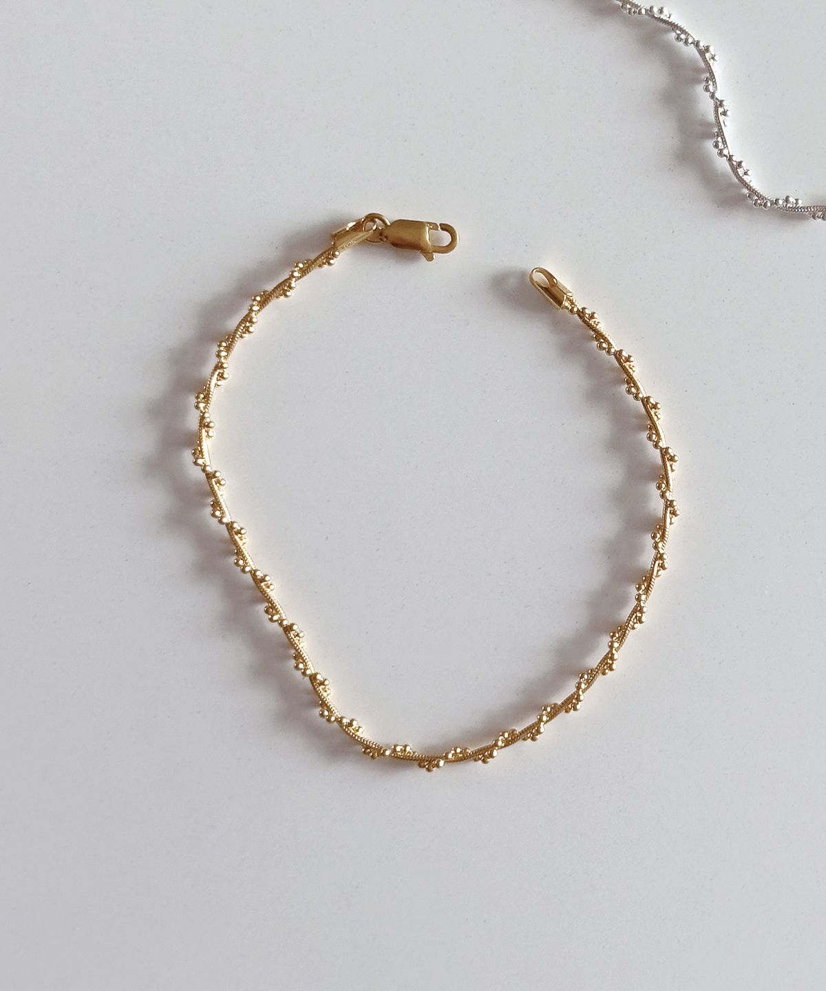 코드에이치(CODE.H) (Silver 925) 아이비 스네이크 체인 브레이슬릿_골드