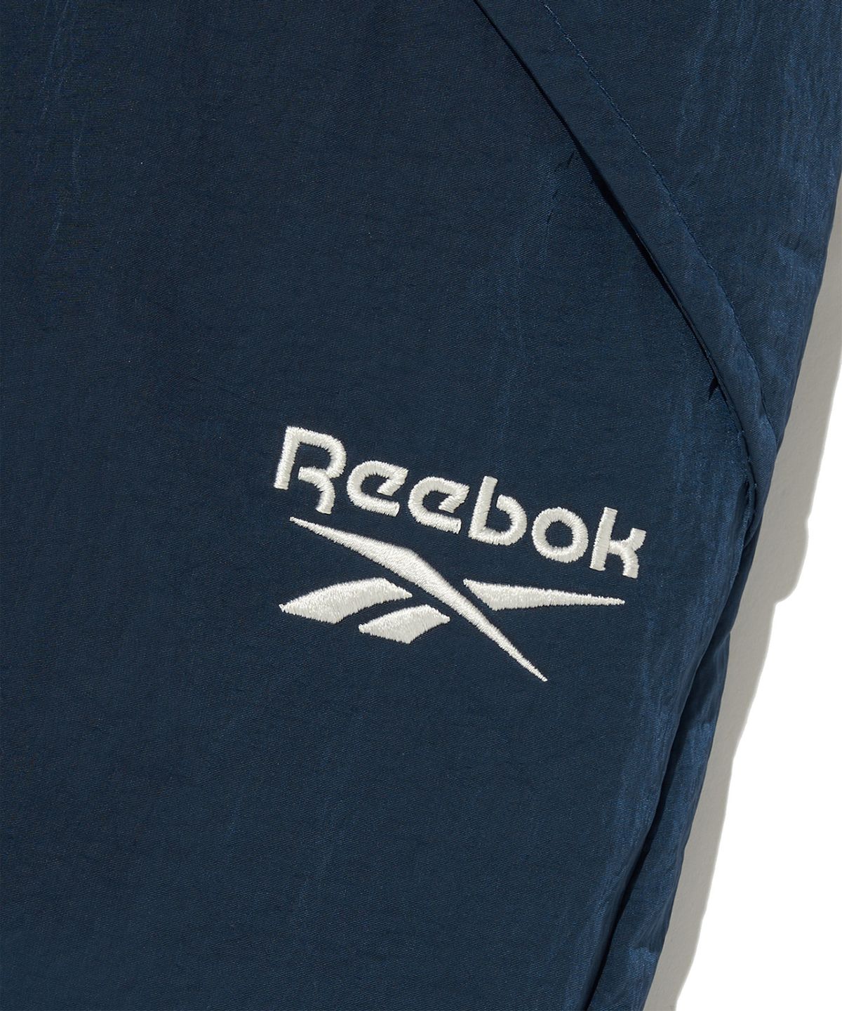 리복(REEBOK) 우븐 스트링 스커트 (W) - 네이비