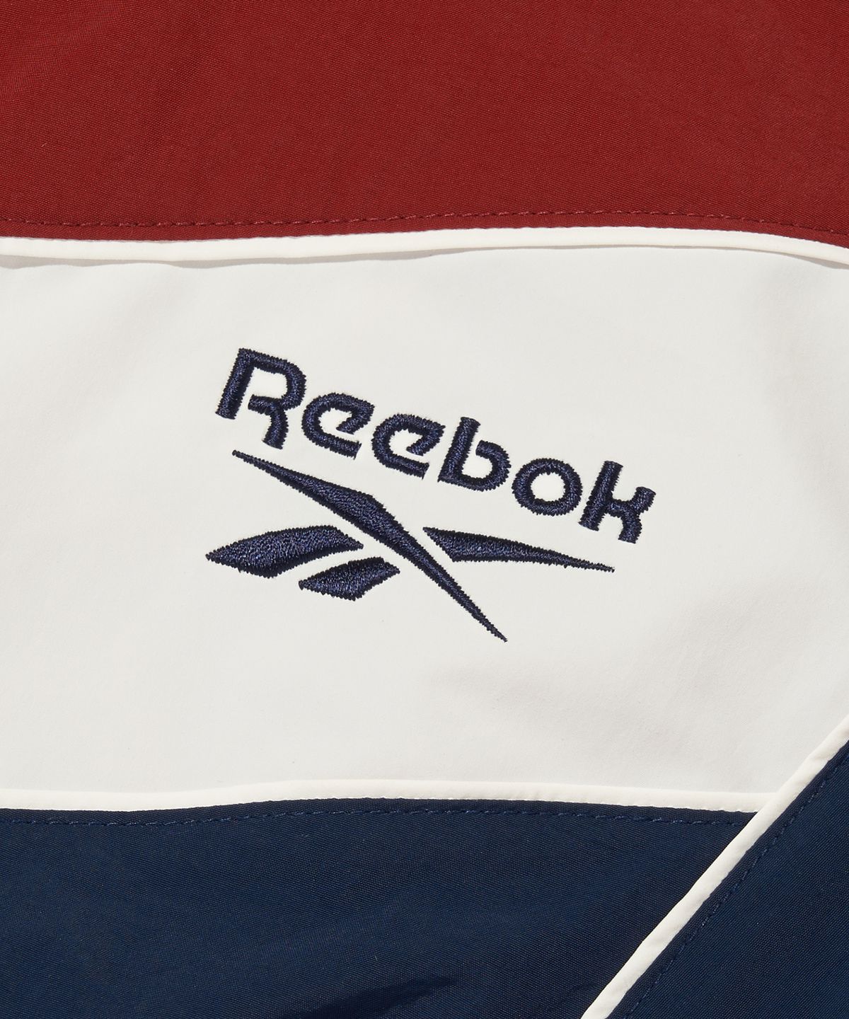 리복(REEBOK) 헤리티지 크롭 윈드 브레이커 (W) - 레드