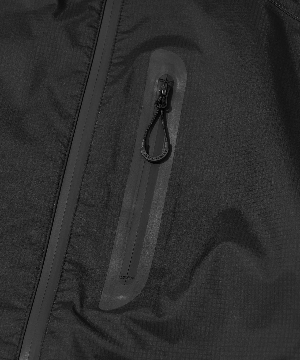 웰터 익스페리먼트(WELTER EXPERIMENT) 3LAYER SLIT REFLECTIVE HARD SHELL JACKET_BLACK_WOL063