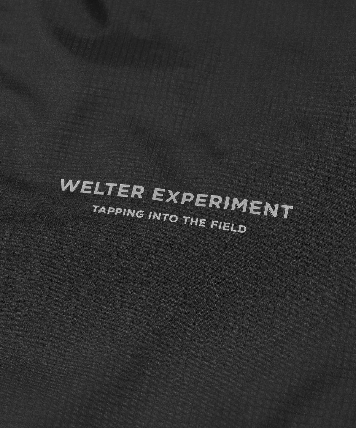 웰터 익스페리먼트(WELTER EXPERIMENT) 3LAYER SLIT REFLECTIVE HARD SHELL JACKET_BLACK_WOL063