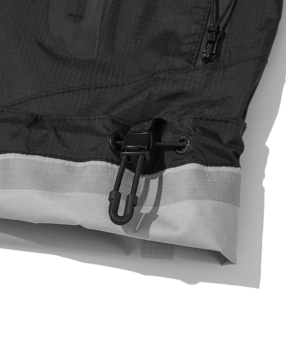 웰터 익스페리먼트(WELTER EXPERIMENT) 3LAYER SLIT REFLECTIVE HARD SHELL JACKET_BLACK_WOL063