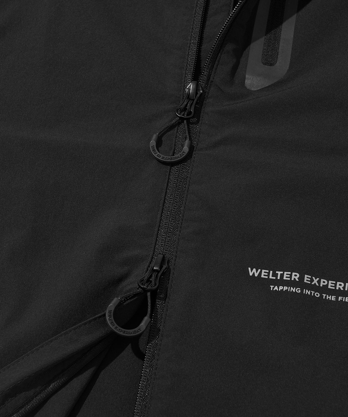 웰터 익스페리먼트(WELTER EXPERIMENT) VEO FLEXABLE WINDBREAKER_BLACK_WOL074