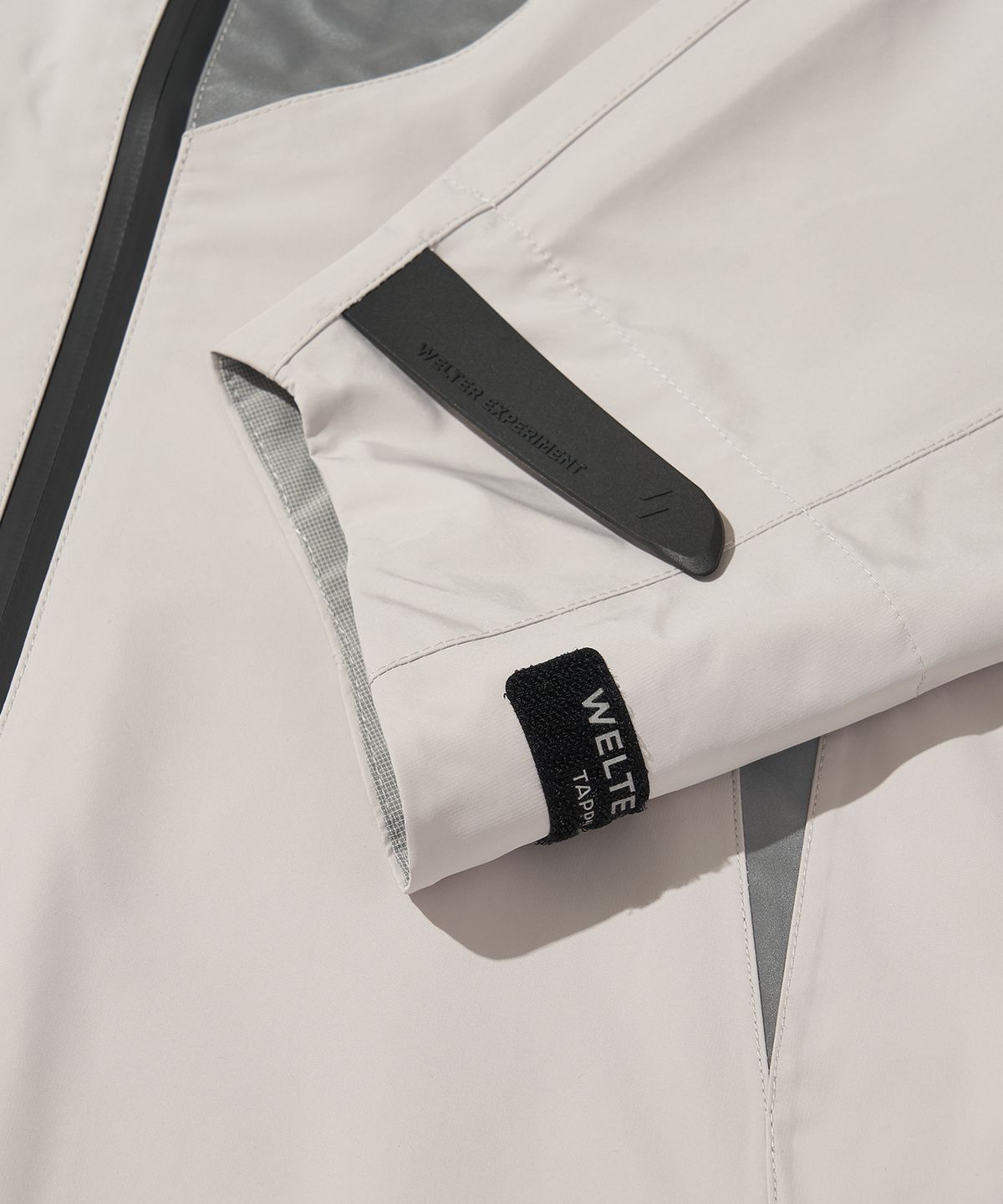 웰터 익스페리먼트(WELTER EXPERIMENT) 3LAYER NUT HOOD SHELL JACKET_WHITE_WOL094