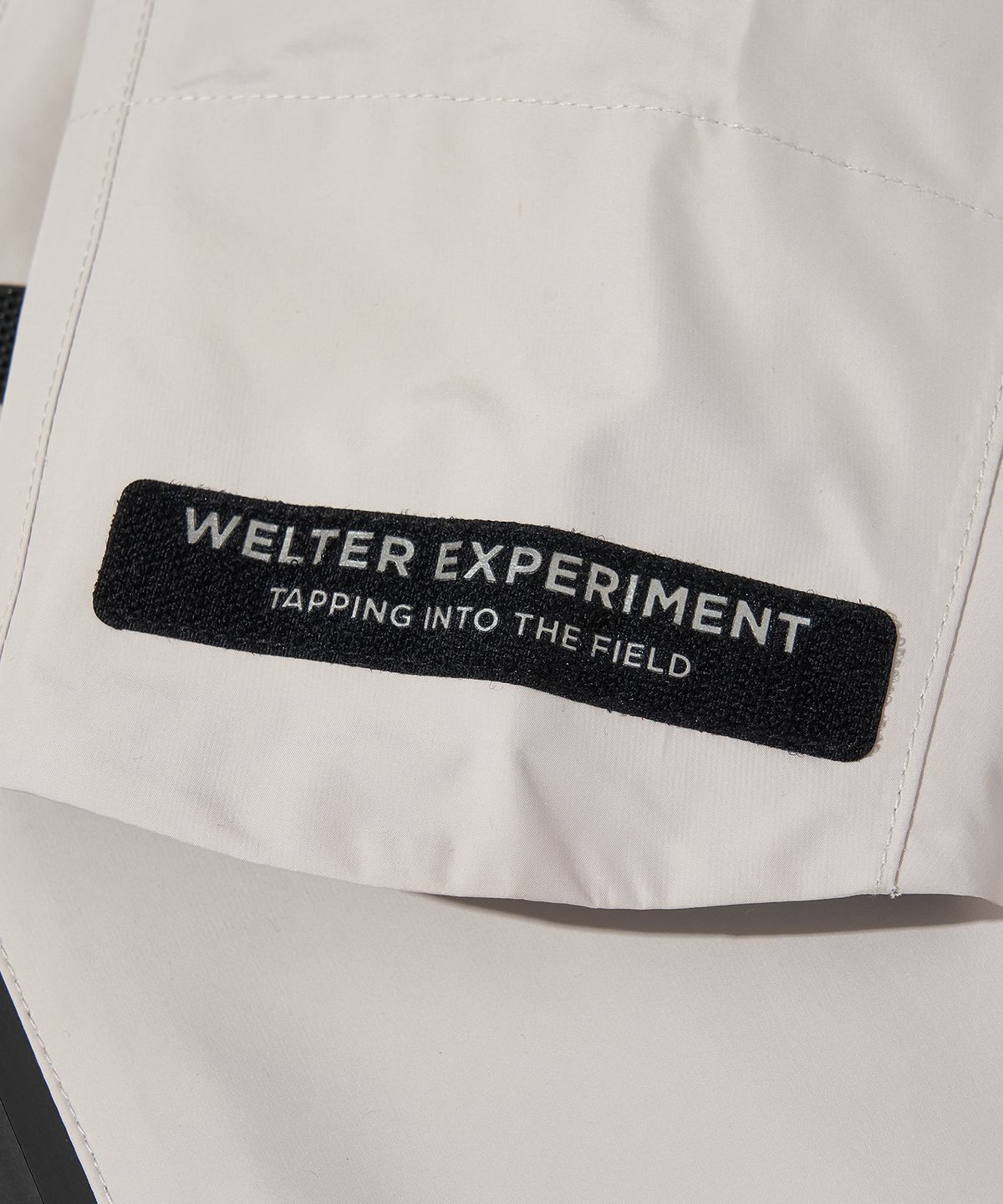 웰터 익스페리먼트(WELTER EXPERIMENT) 3LAYER NUT HOOD SHELL JACKET_WHITE_WOL094