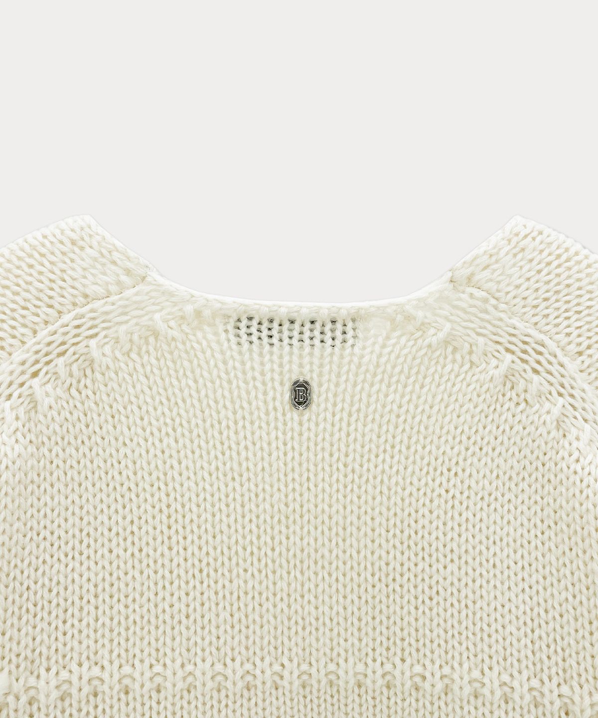썸웨어버터(SOMEWHEREBUTTER) Tope Wool V-Neck Knit - Cream