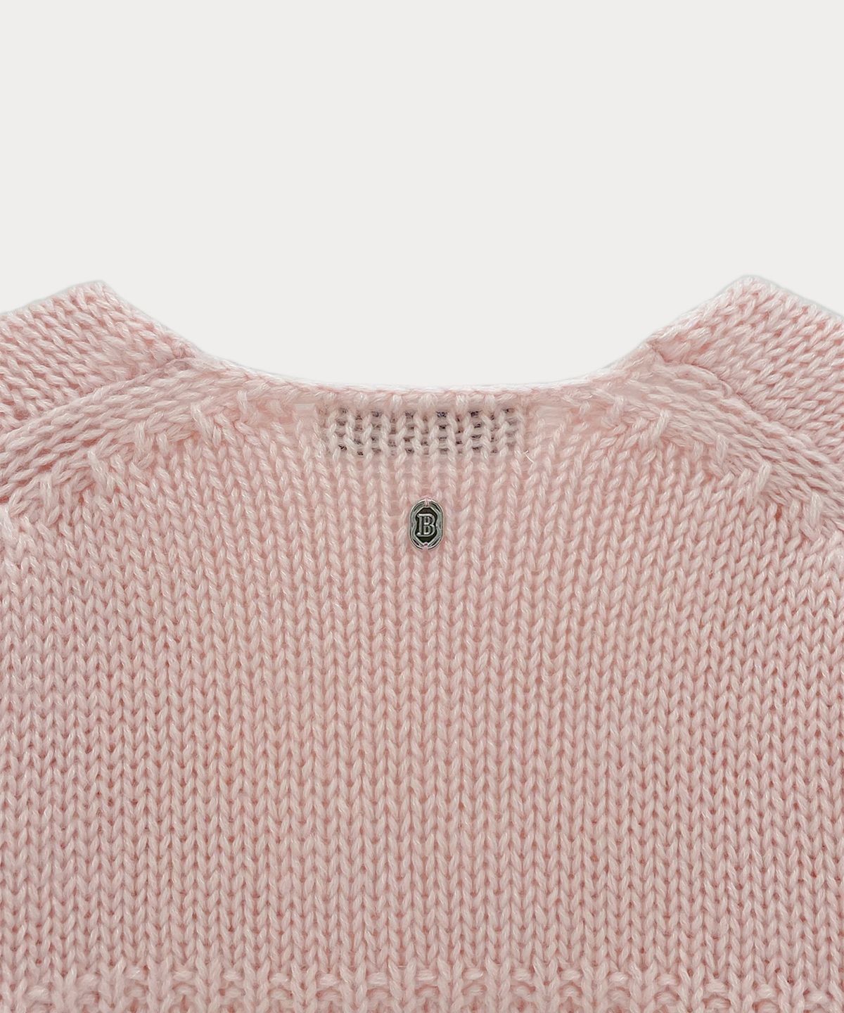 썸웨어버터(SOMEWHEREBUTTER) Tope Wool V-Neck Knit - Pink