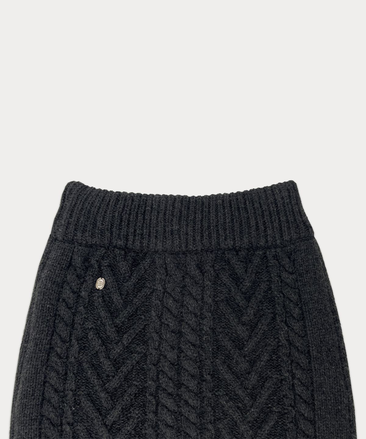 썸웨어버터(SOMEWHEREBUTTER) Colleen Cable Knit Skirt - Charcoal