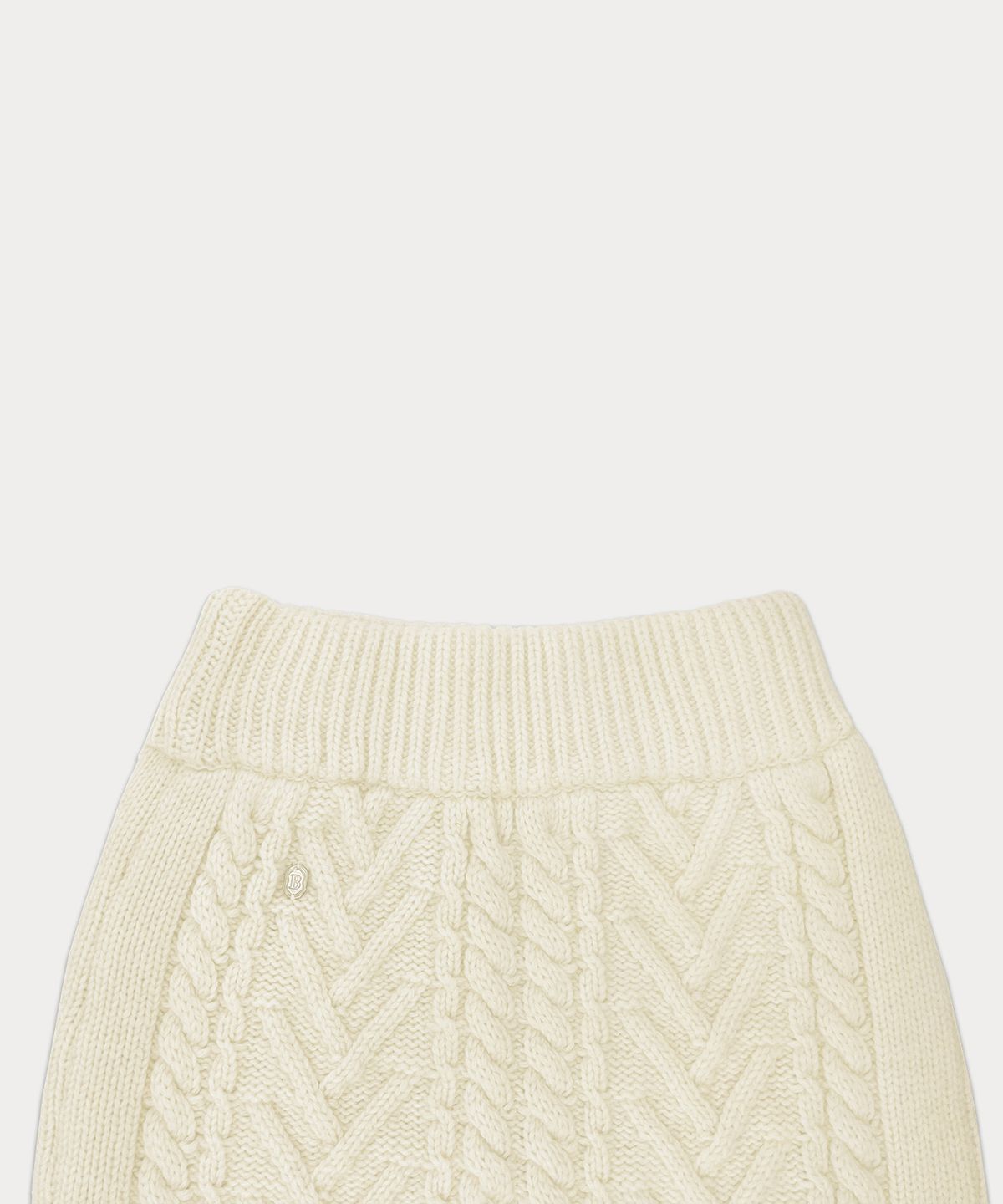 썸웨어버터(SOMEWHEREBUTTER) Colleen Cable Knit Skirt - Ivory