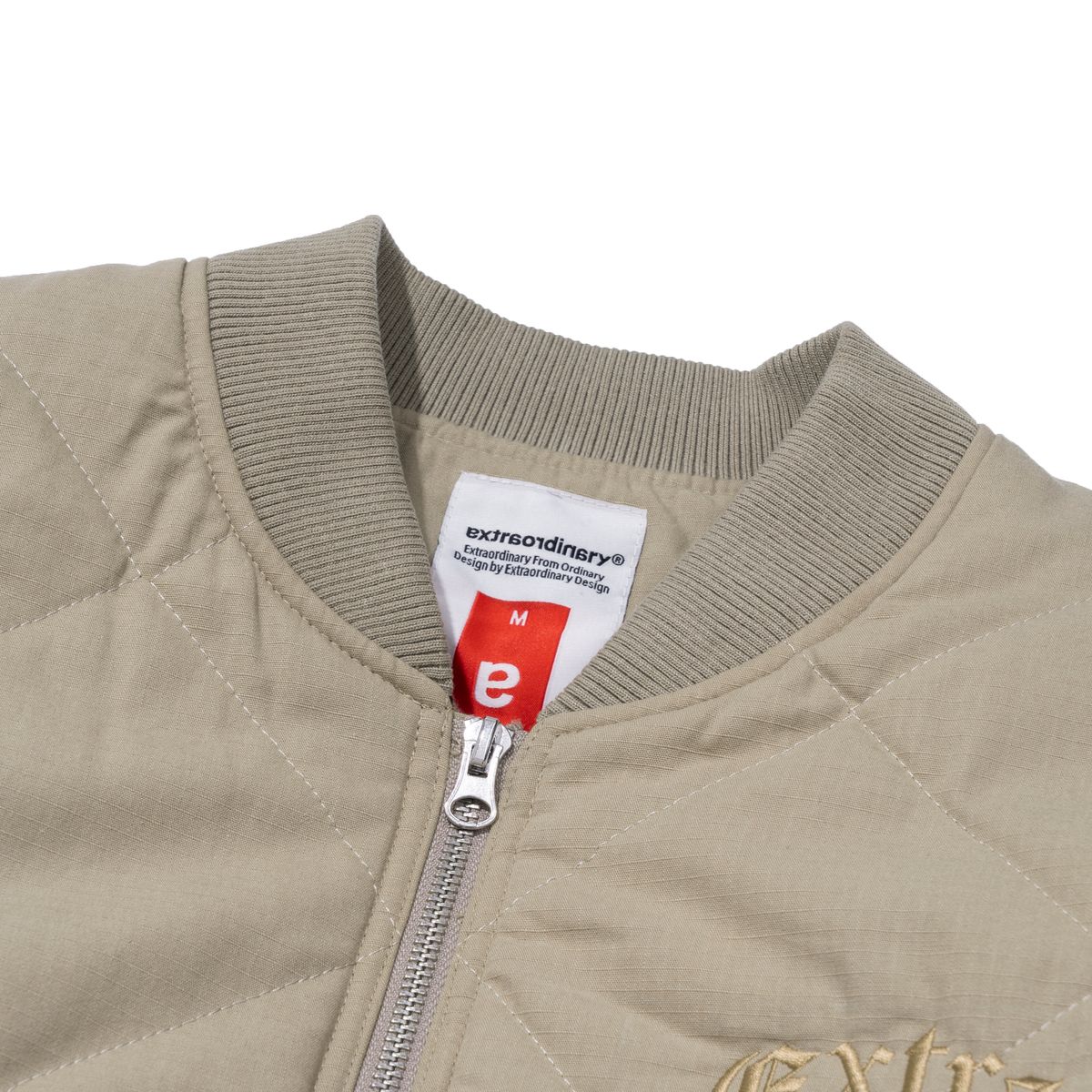 엑스트라오디너리(EXTRAORDINARY) MEDIEVAL LOGO QUILTING JUMPER  BEIGE