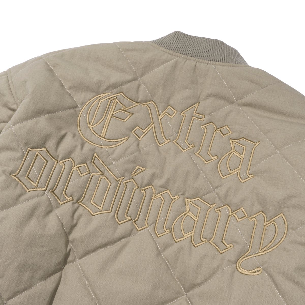엑스트라오디너리(EXTRAORDINARY) MEDIEVAL LOGO QUILTING JUMPER  BEIGE