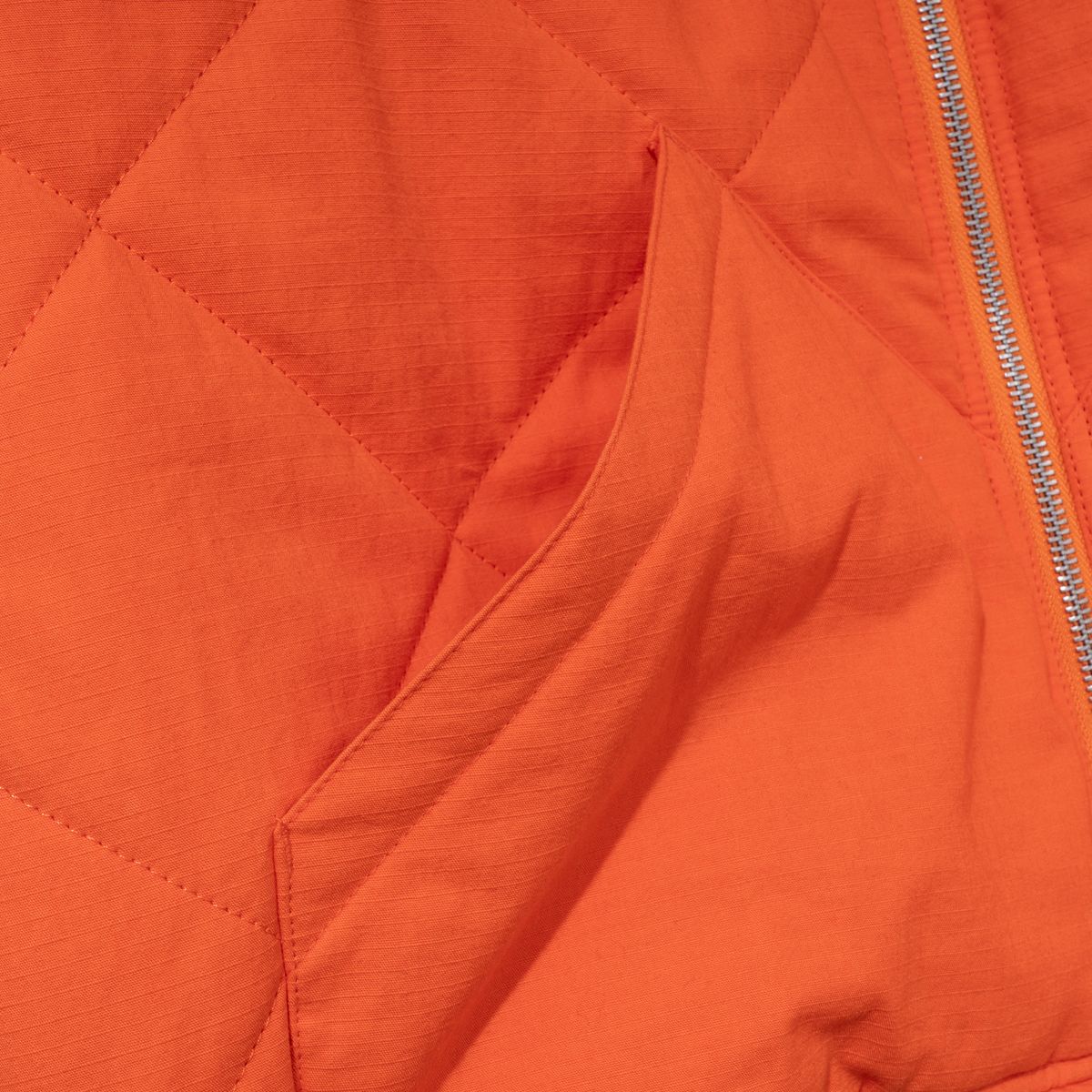 엑스트라오디너리(EXTRAORDINARY) MEDIEVAL LOGO QUILTING JUMPER  ORANGE