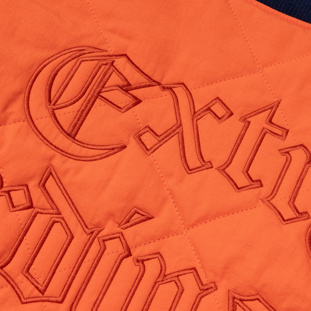 엑스트라오디너리(EXTRAORDINARY) MEDIEVAL LOGO QUILTING JUMPER  ORANGE