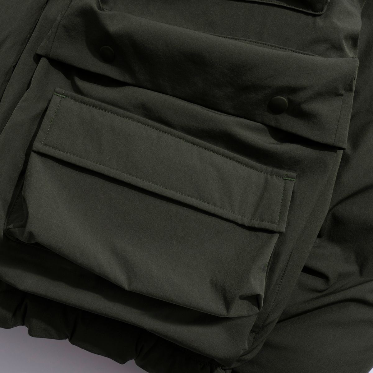 엑스트라오디너리(EXTRAORDINARY) MULTI POCKET DOWN JUMPER  KHAKI