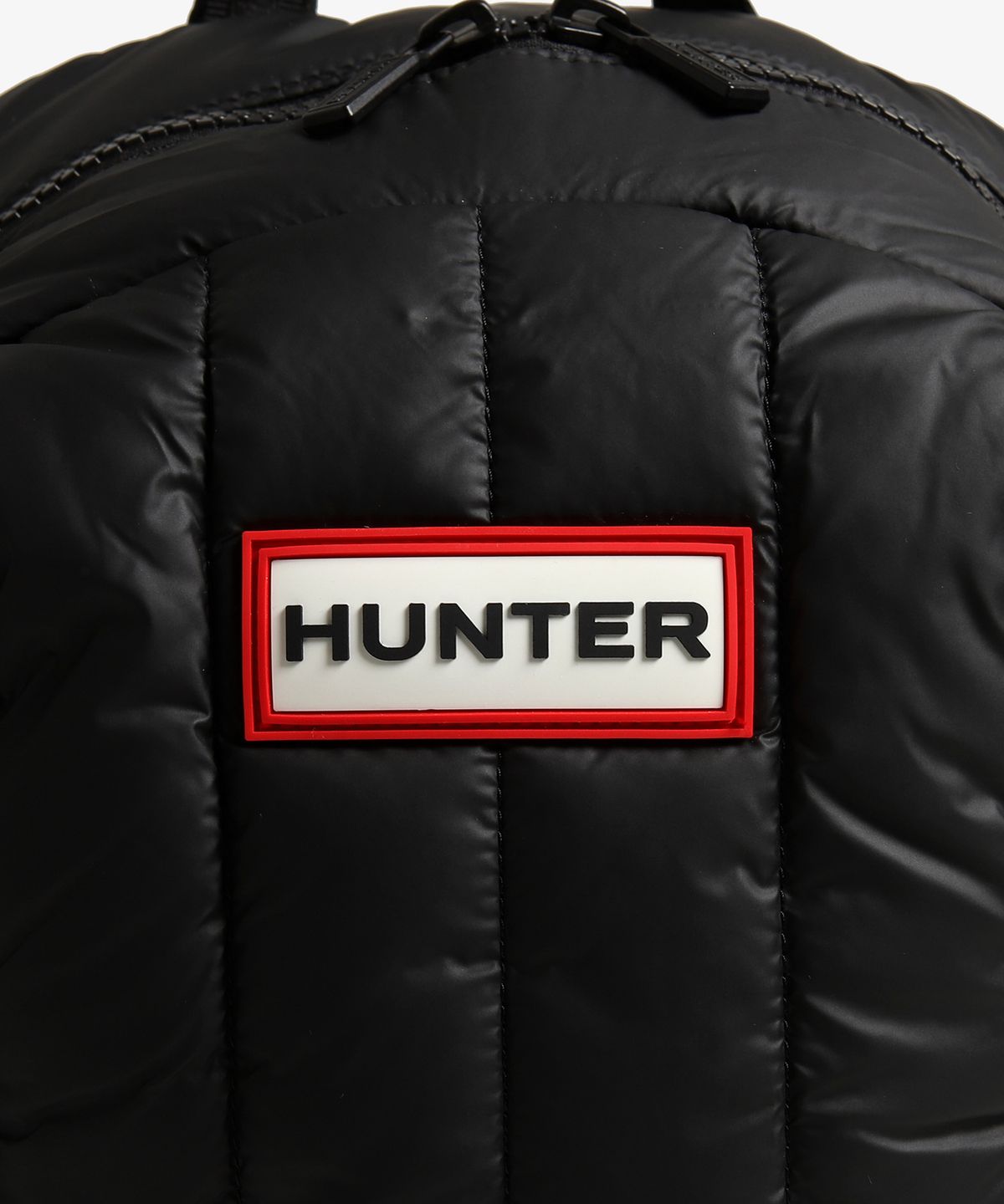 헌터(HUNTER) [UNISEX] 인트레피드 푸퍼 라지 백팩 - 블랙/레드박스 로고