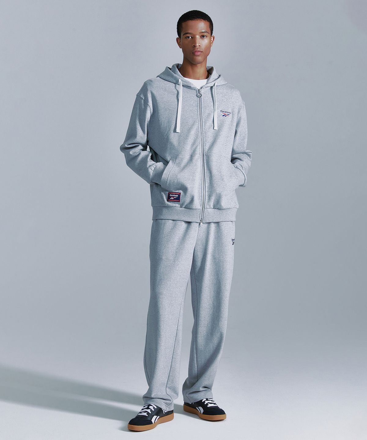 리복(REEBOK) 벡터 후드집업 - 그레이