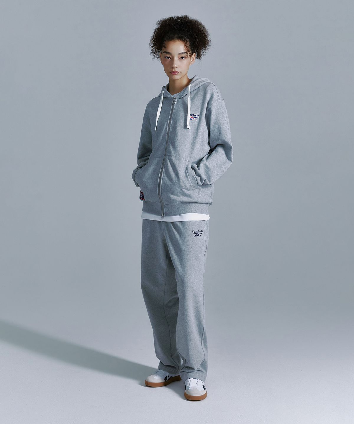 리복(REEBOK) 벡터 후드집업 - 그레이