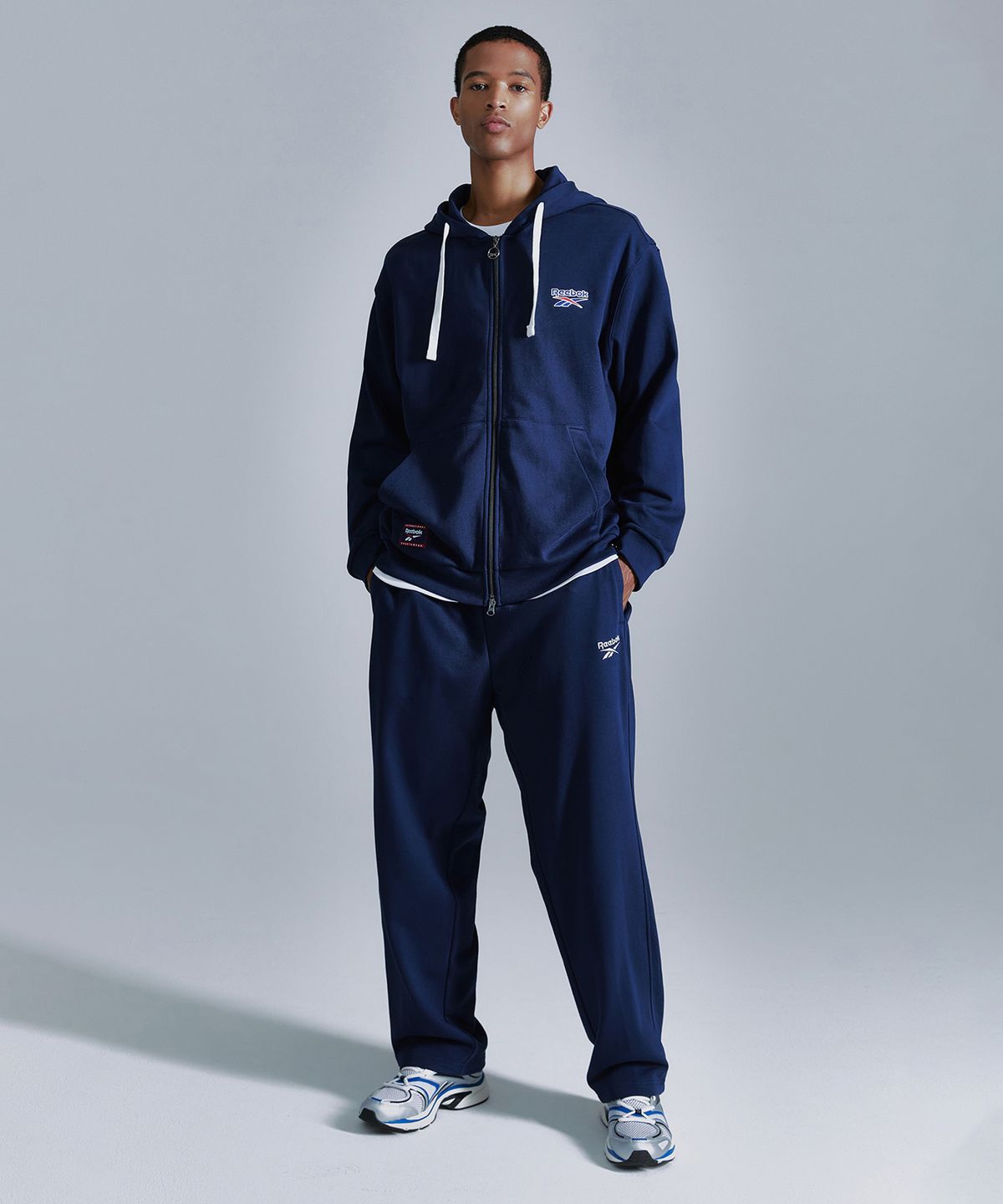 리복(REEBOK) 벡터 후드집업 - 네이비