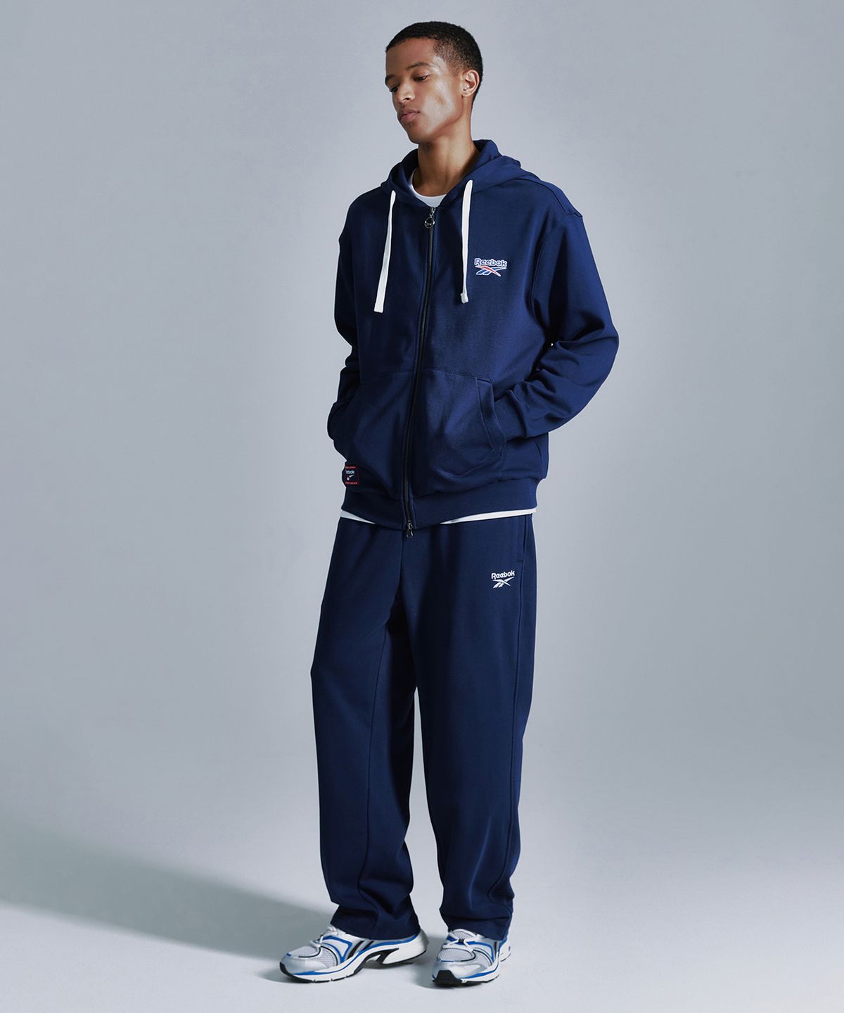 리복(REEBOK) 벡터 후드집업 - 네이비