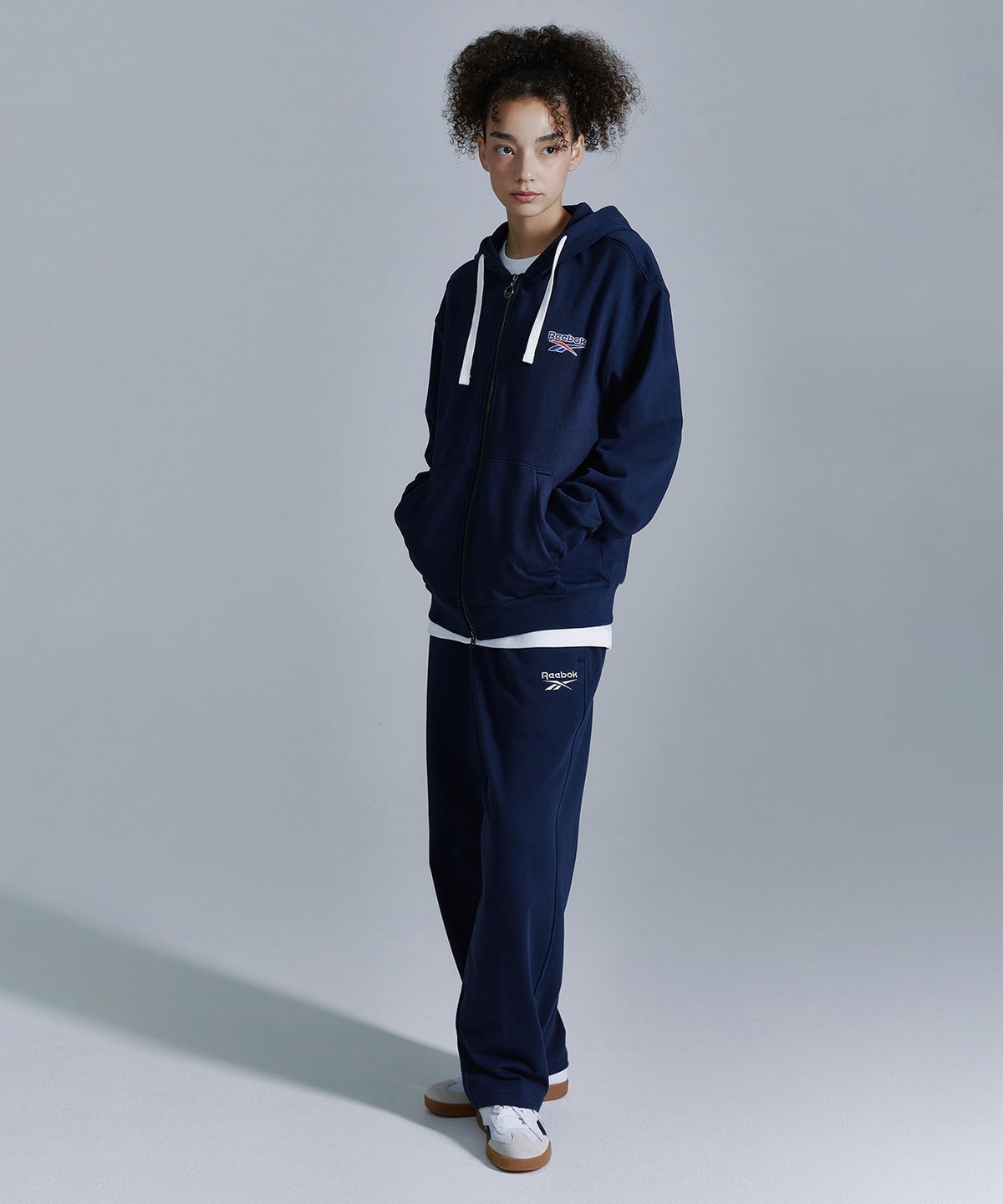 리복(REEBOK) 벡터 후드집업 - 네이비