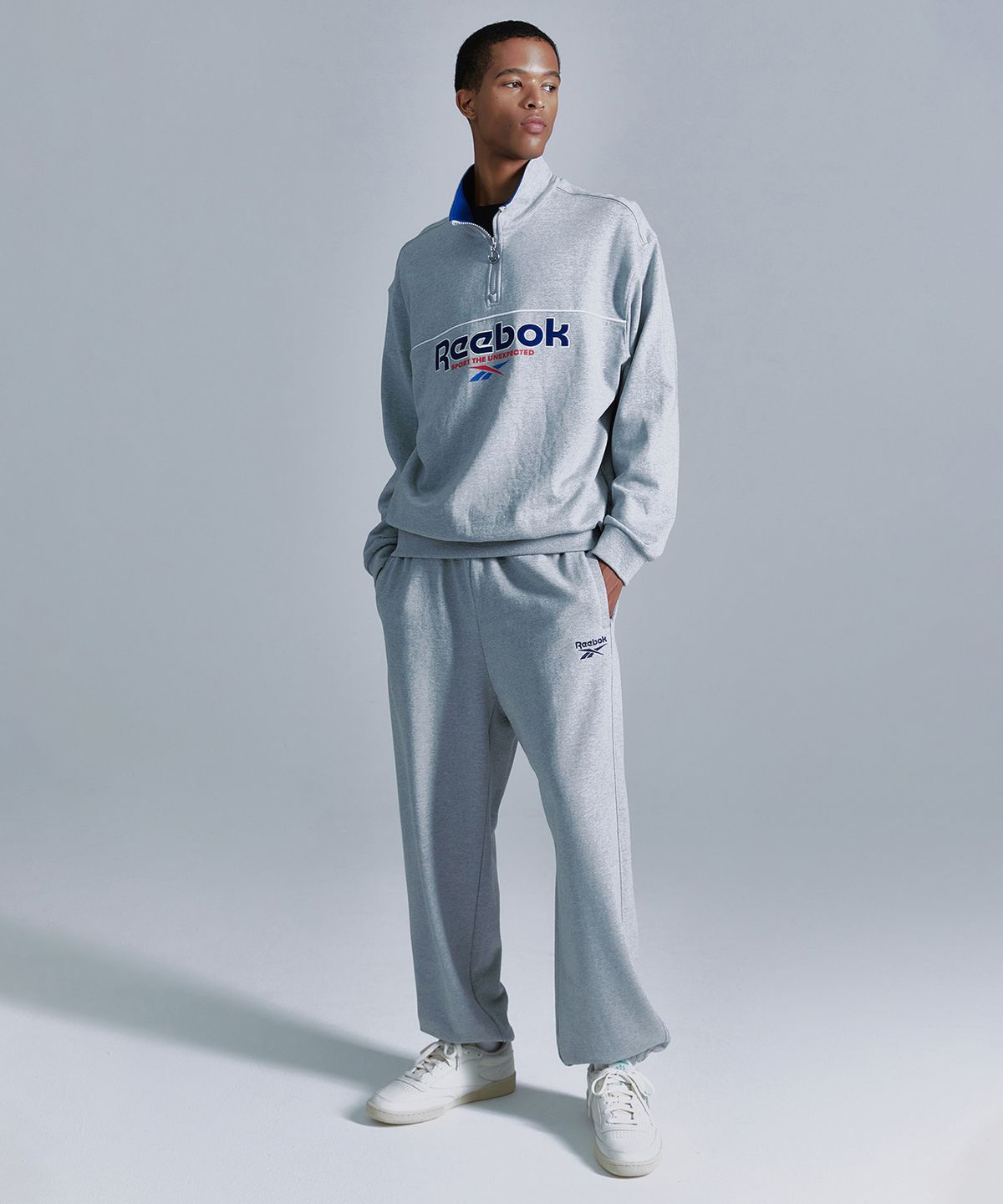 리복(REEBOK) 벡터 하프 집업 - 그레이