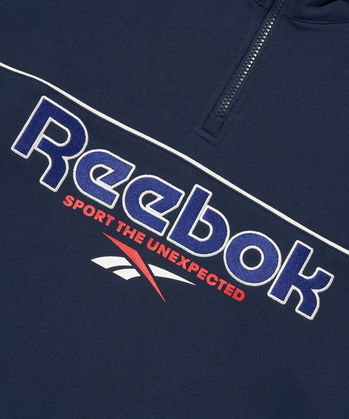 리복(REEBOK) 벡터 하프 집업 - 네이비