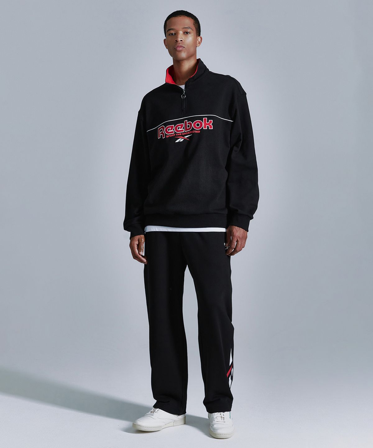 리복(REEBOK) 벡터 하프 집업 - 블랙