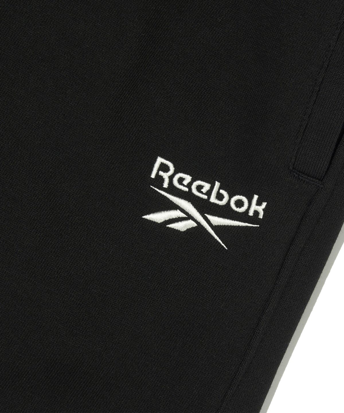 리복(REEBOK) 빅벡터 루즈핏 스웨트 팬츠 - 블랙