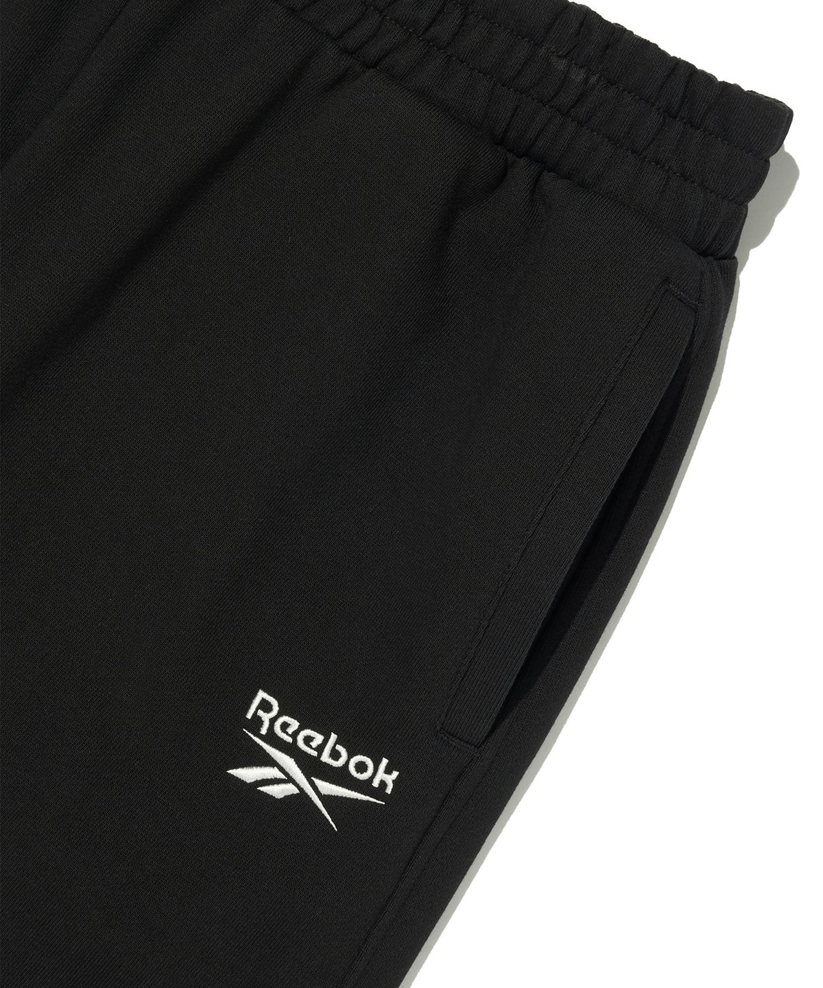 리복(REEBOK) 빅벡터 루즈핏 스웨트 팬츠 - 블랙
