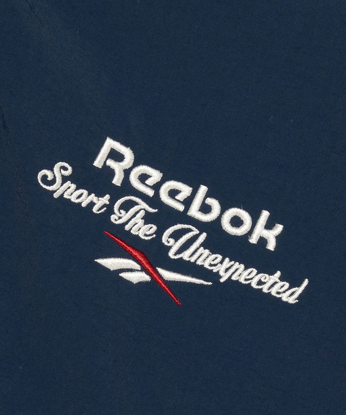 리복(REEBOK) 블루종 윈드 브레이커 (W) - 네이비