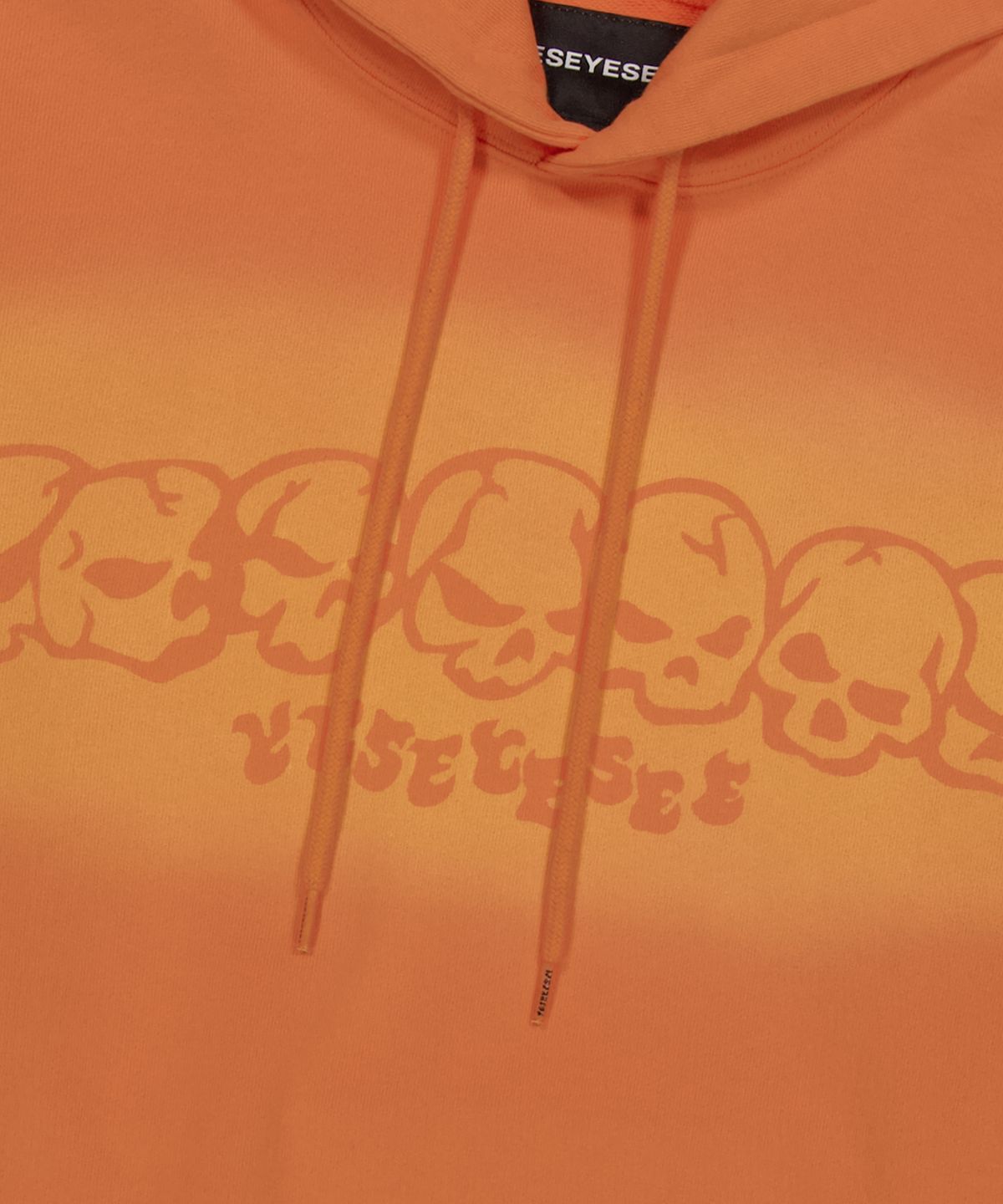 예스아이씨(YESEYESEE) Y.E.S Fade-out Skull Hoodie Orange