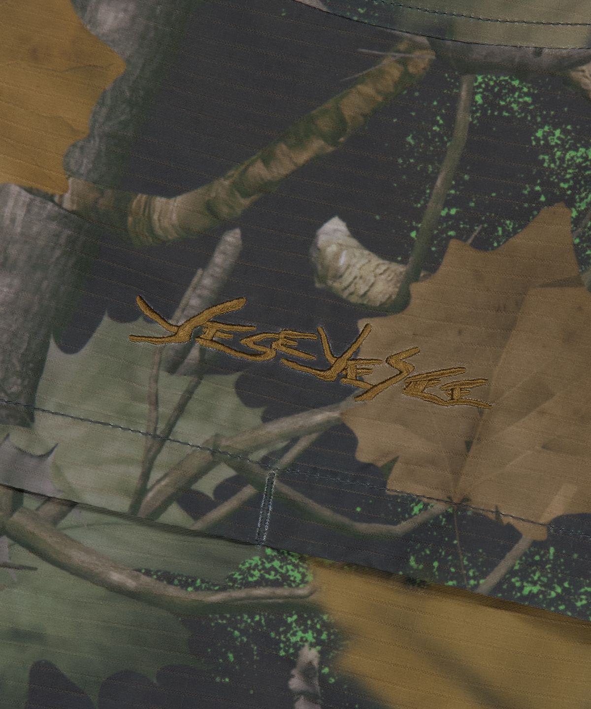 예스아이씨(YESEYESEE) Zephyros Windbreaker Camo