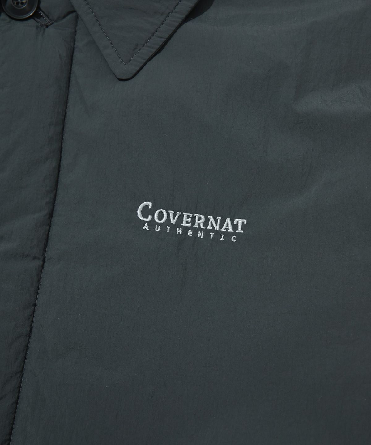 커버낫(COVERNAT) 패디드 코치 자켓 차콜