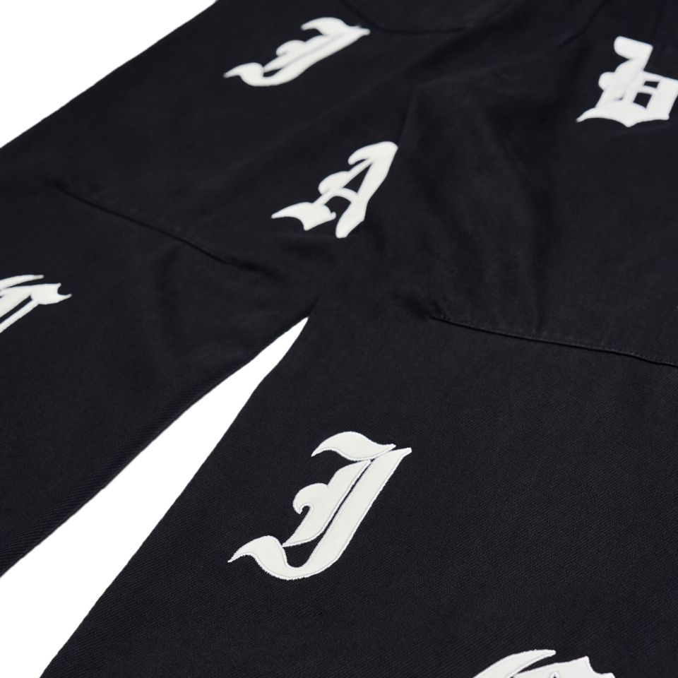 MUSINSA公式 | SCHISM INDUCING SCHISM PATCH JEANS BLACK