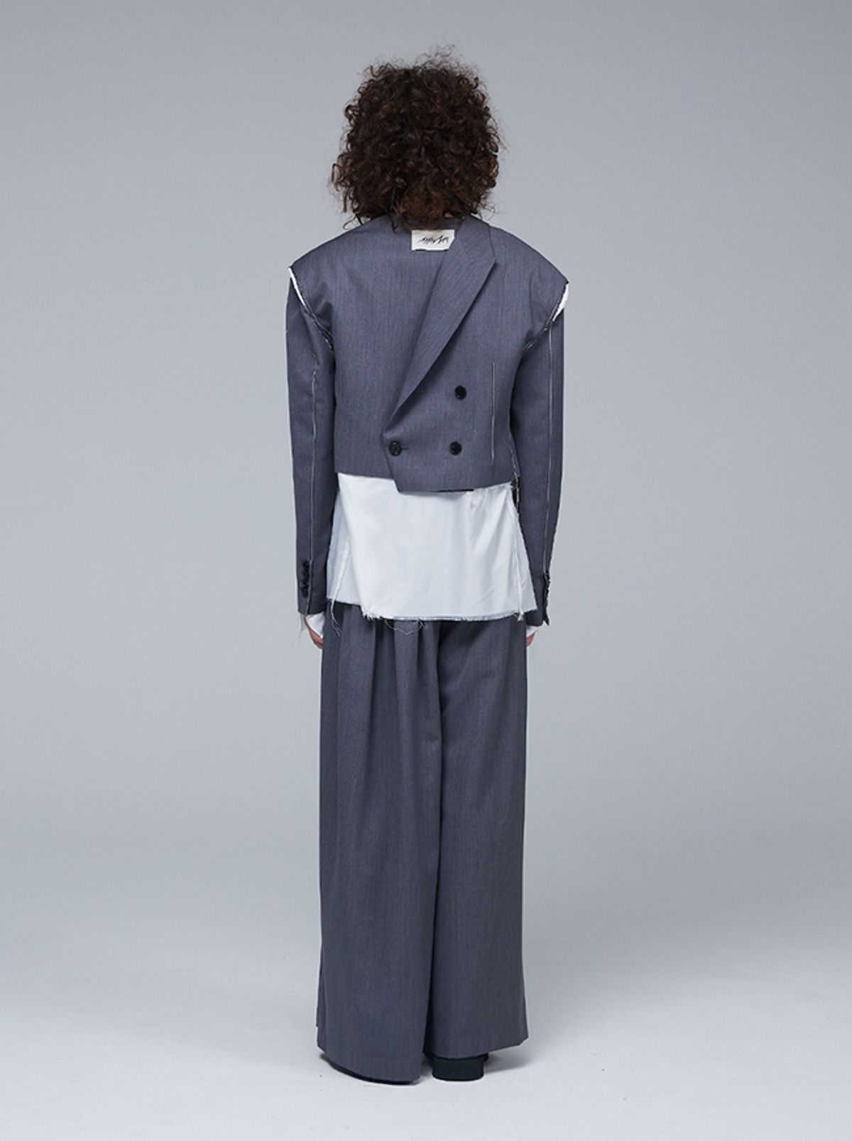 므아므(MMAM) Signature unbalance pin tuck logo band flare slacks