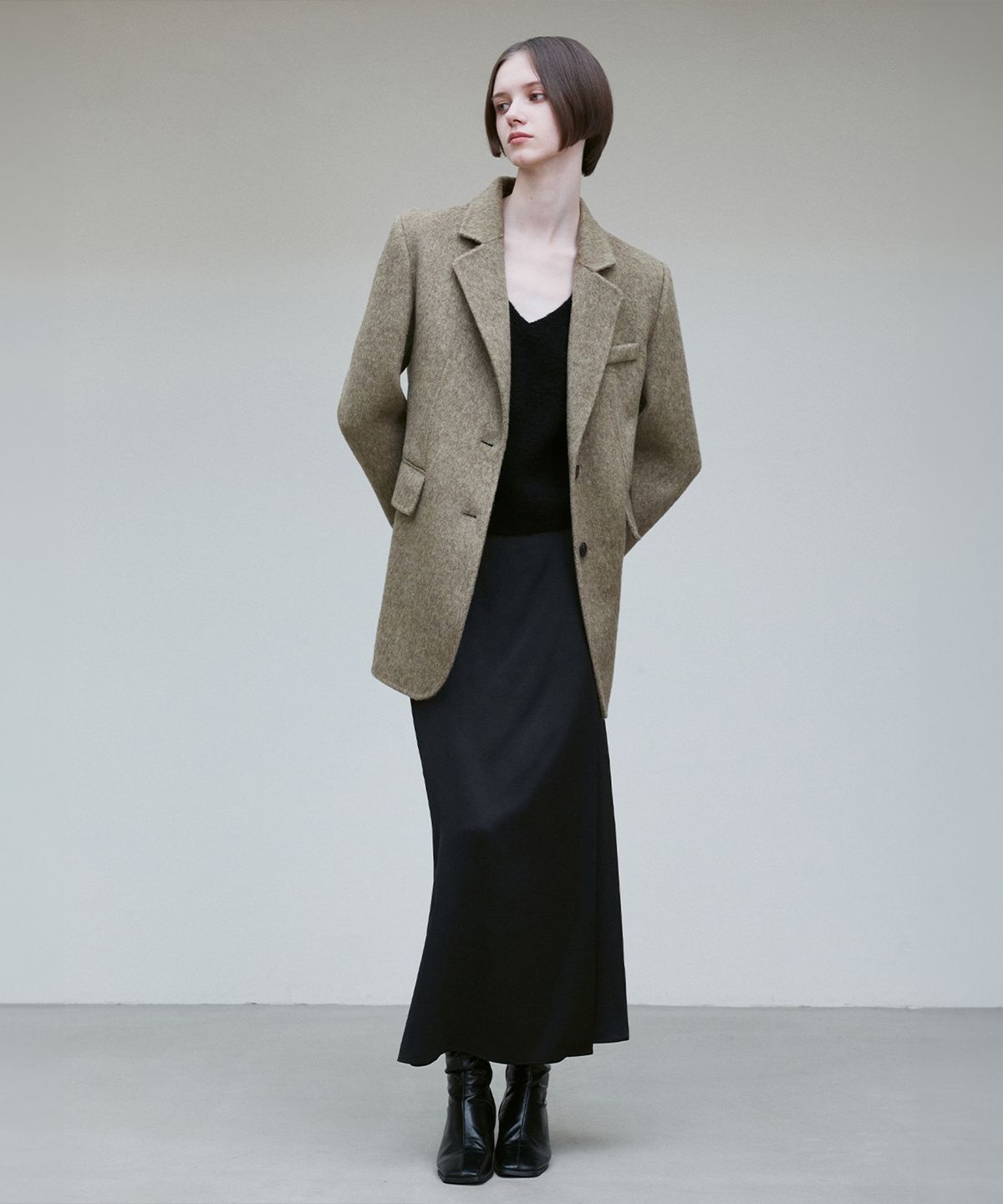 리이(RE RHEE) SILKY WRAP MIDI SKIRT