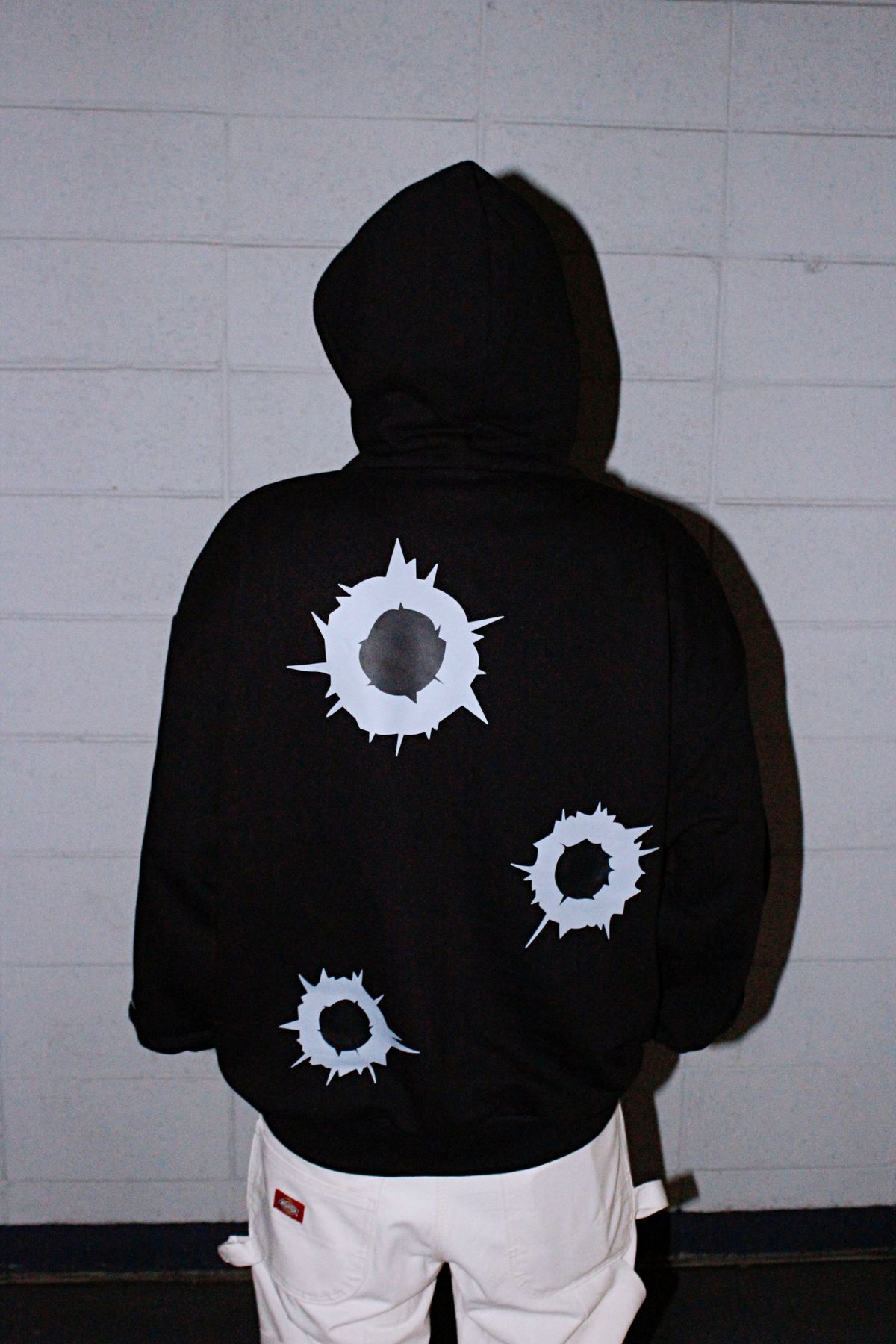 커뮤니티클럽(COMMUNITY CLUB) BULLET HOLE HOODIE