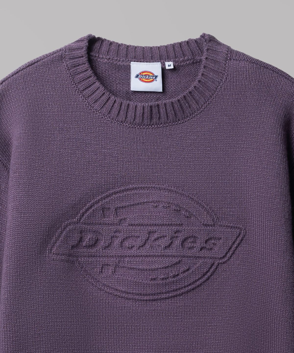 디키즈(DICKIES) 엠보스드 로고 풀오버 크롭 니트 Purple
