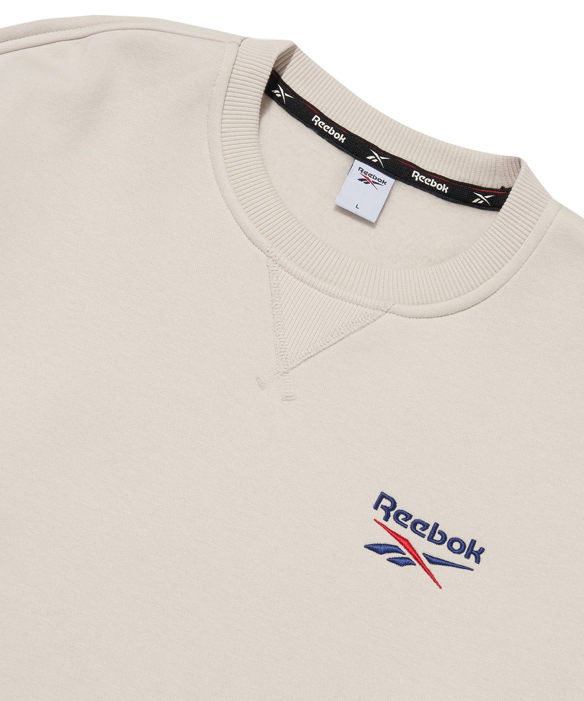 리복(REEBOK) 레터링 기모 맨투맨 - 베이지