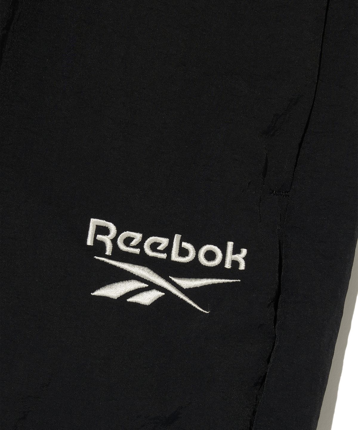 리복(REEBOK) 에센셜 웜업 팬츠 - 블랙