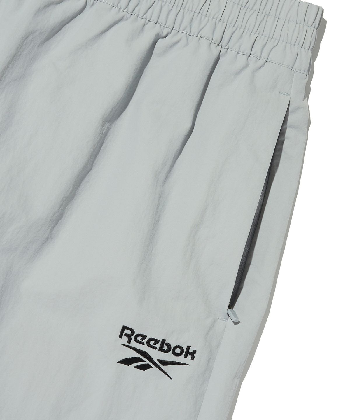 리복(REEBOK) 에센셜 웜업 팬츠 - 그레이
