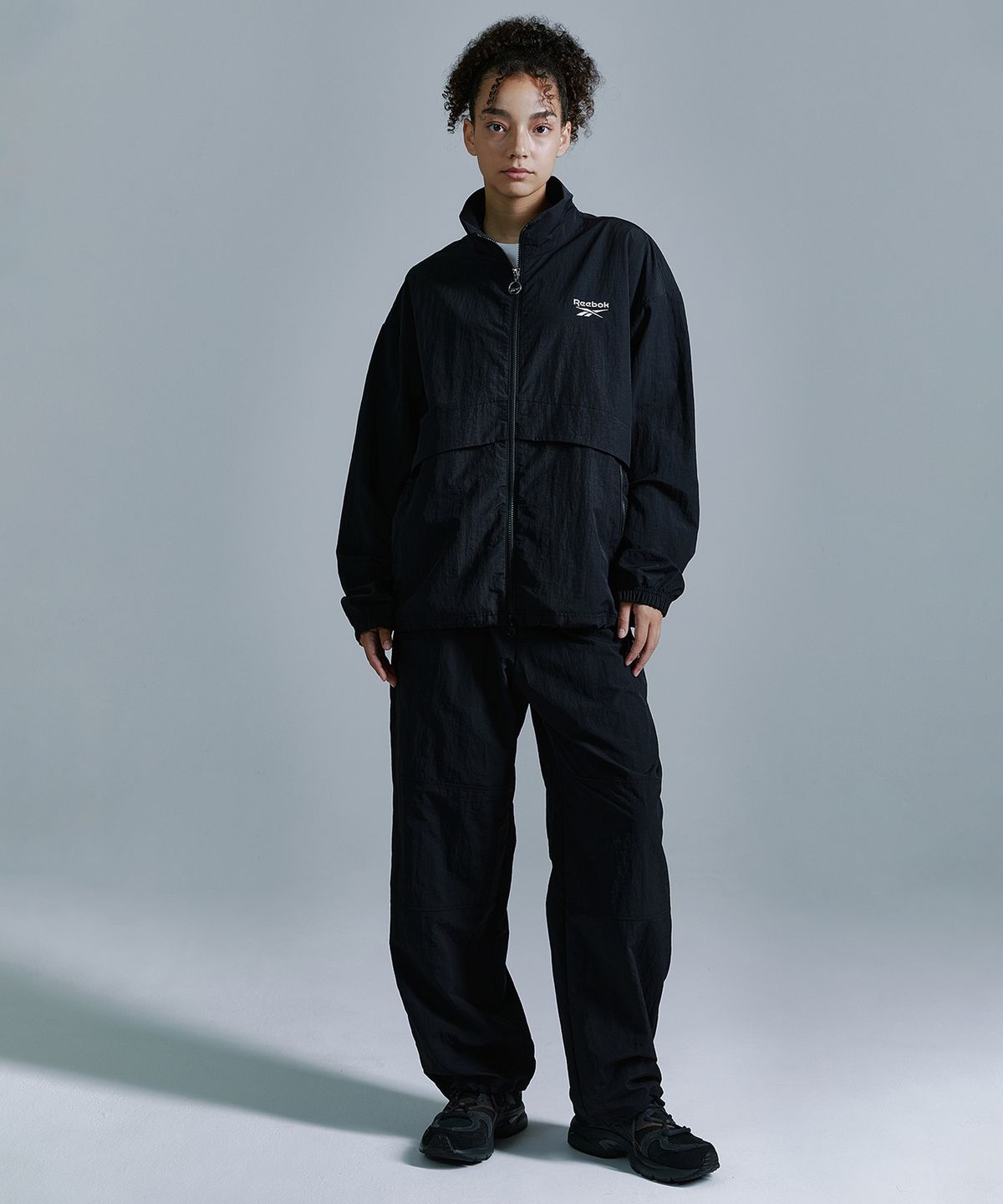 리복(REEBOK) 에센셜 윈드 브레이커 - 블랙
