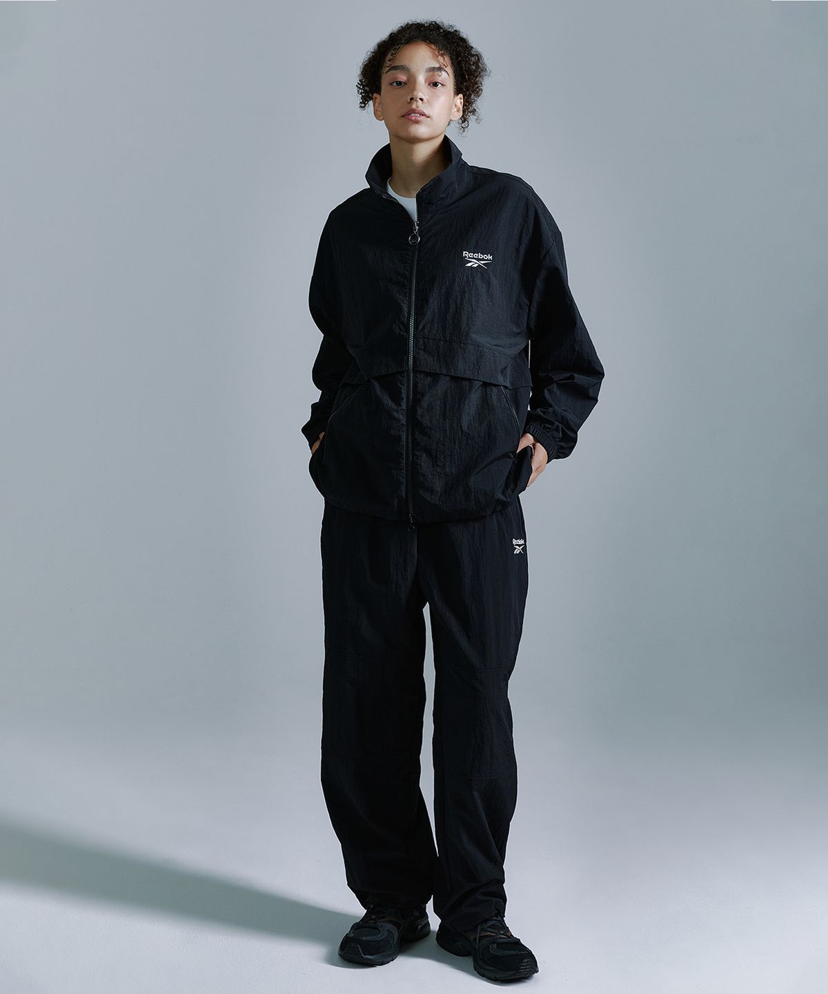 리복(REEBOK) 에센셜 윈드 브레이커 - 블랙