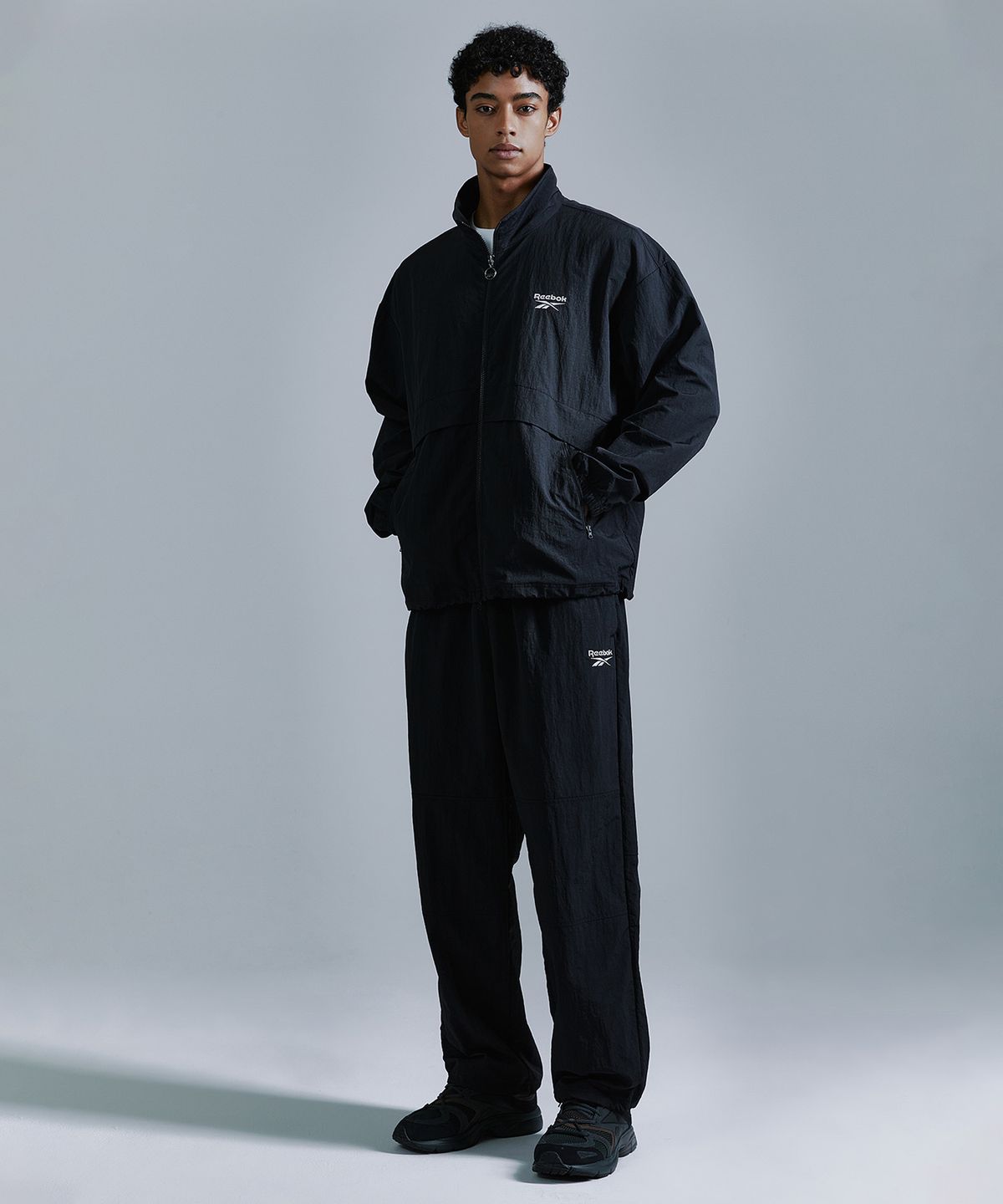 리복(REEBOK) 에센셜 윈드 브레이커 - 블랙