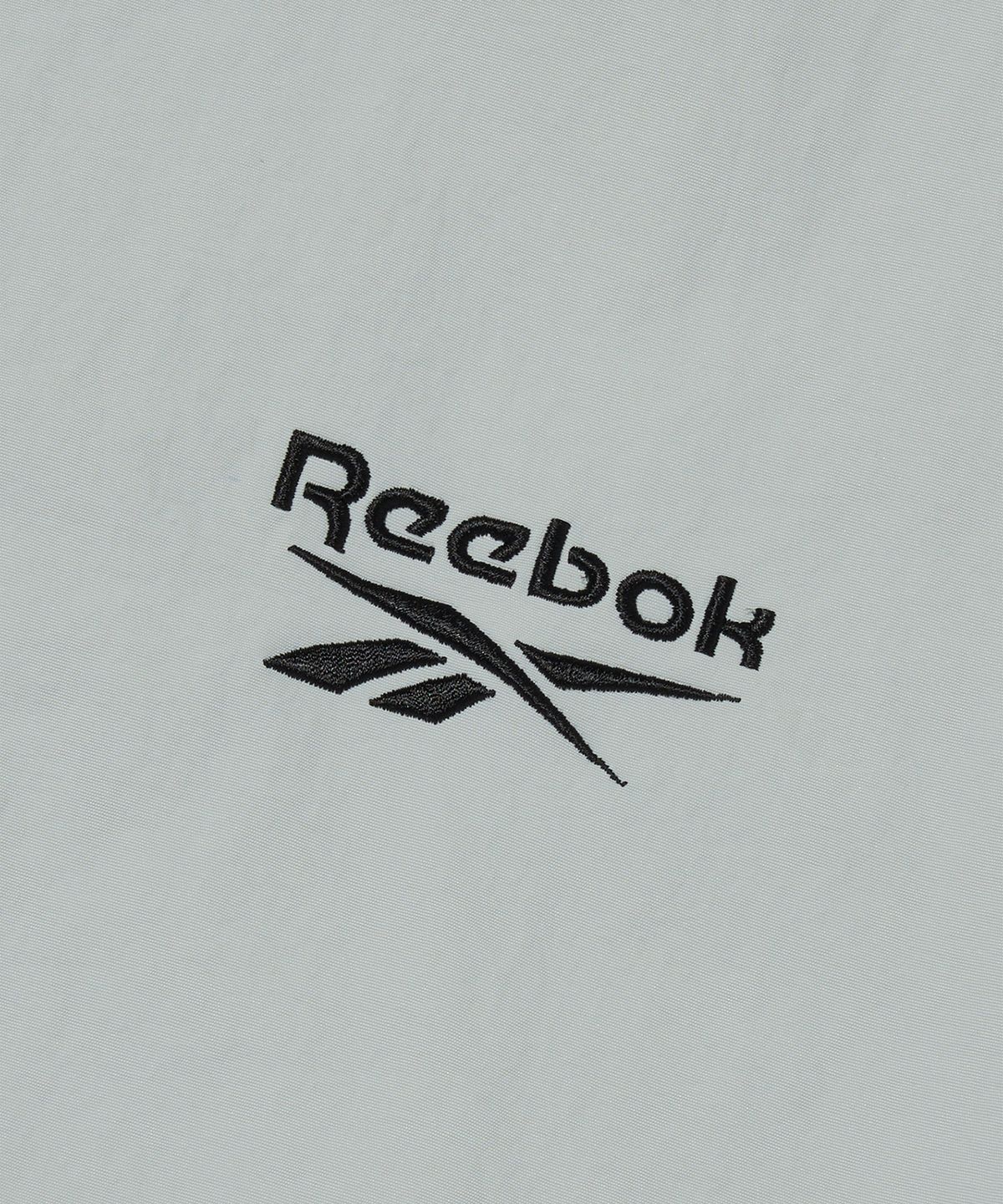 리복(REEBOK) 에센셜 윈드 브레이커 - 그레이