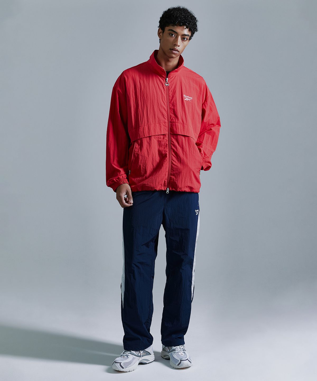 리복(REEBOK) 에센셜 윈드 브레이커 - 레드