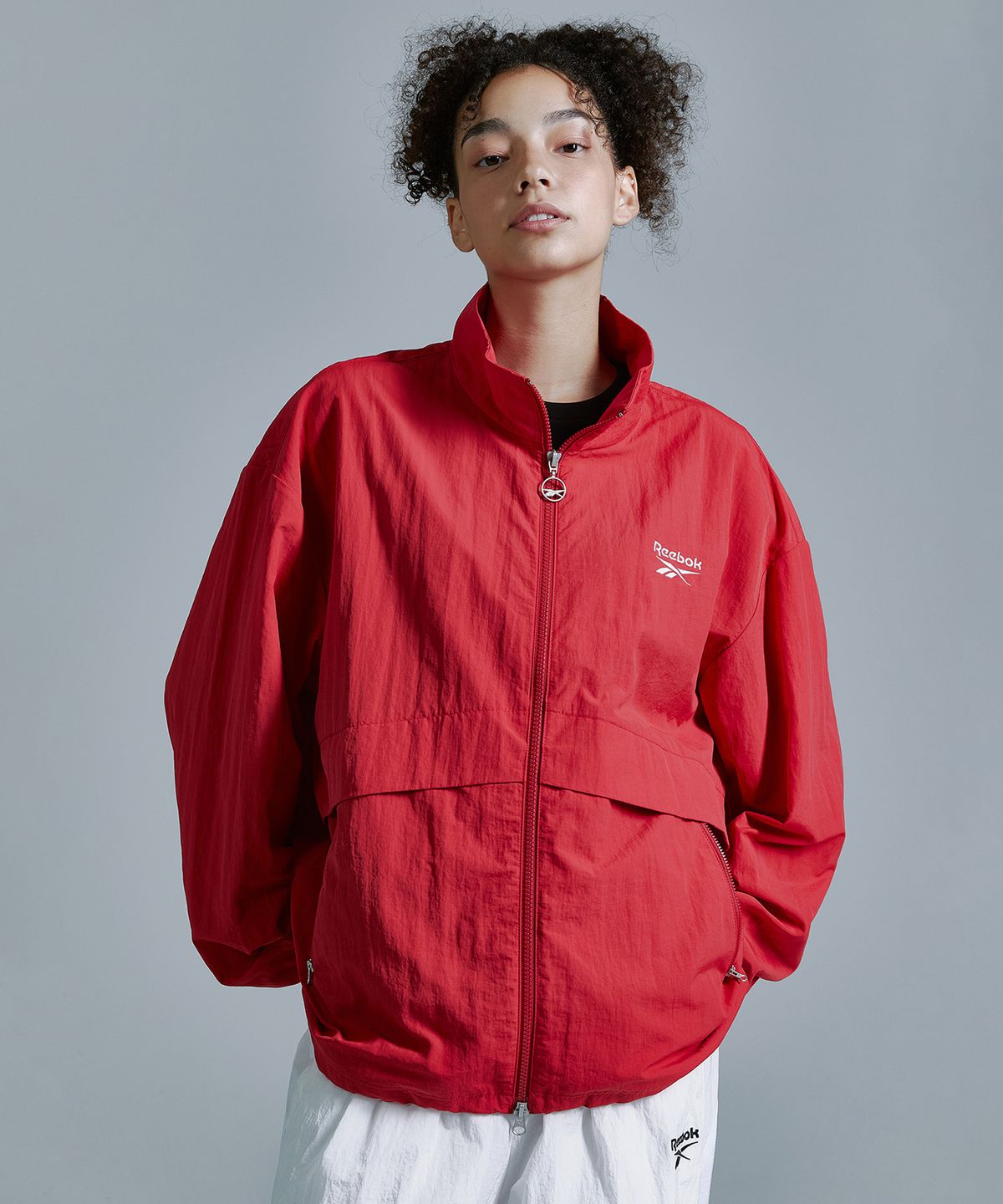 리복(REEBOK) 에센셜 윈드 브레이커 - 레드