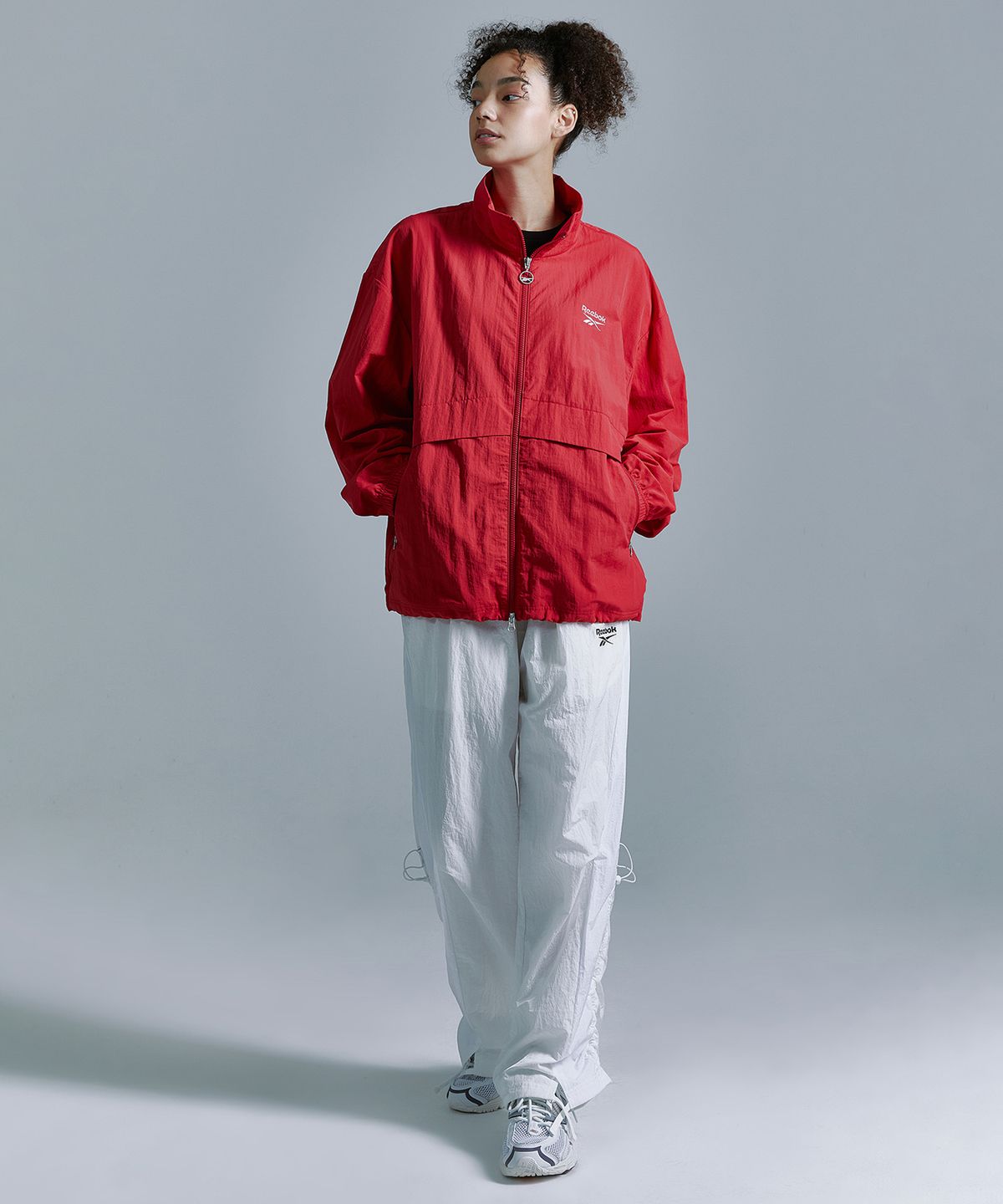 리복(REEBOK) 에센셜 윈드 브레이커 - 레드