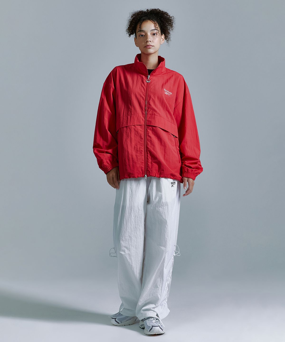 리복(REEBOK) 에센셜 윈드 브레이커 - 레드